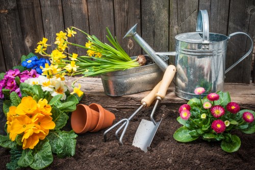 Landscaping team preparing a garden project under service terms